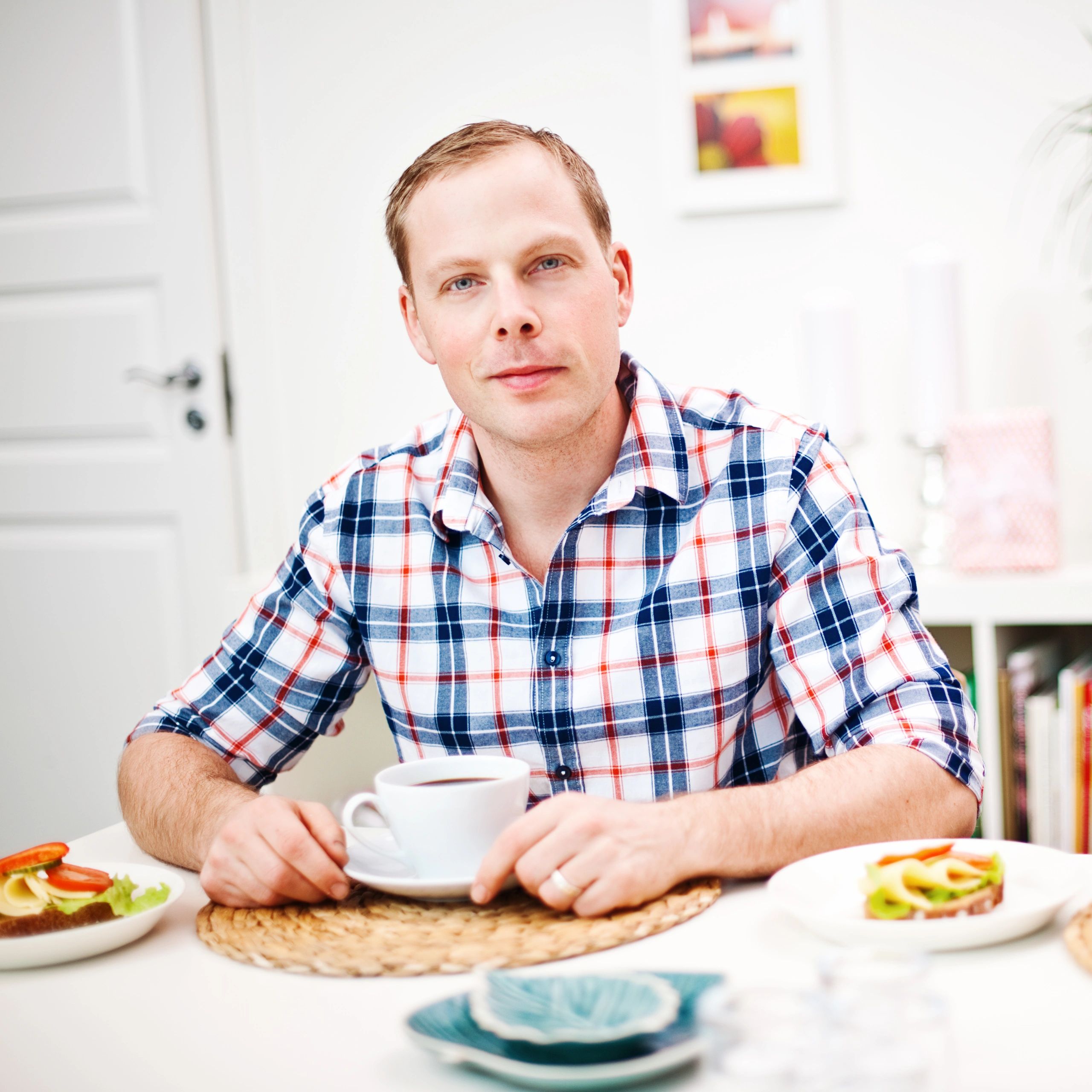 Portrait of a satisfied customer in a kitchen setting