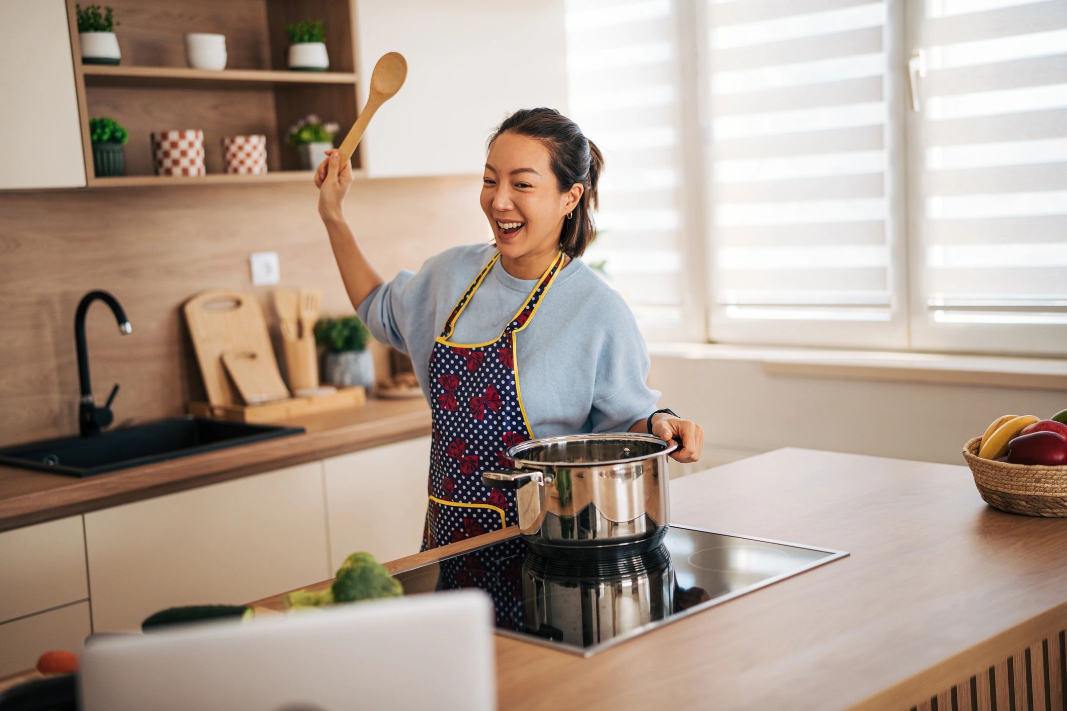 Happy home cook in a modern kitchen